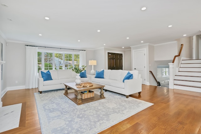 25 Conrad Rd, New Canaan, CT 06840 - living area featuring plenty of natural light, ornamental molding, wood finished floors, recessed lighting, and baseboards