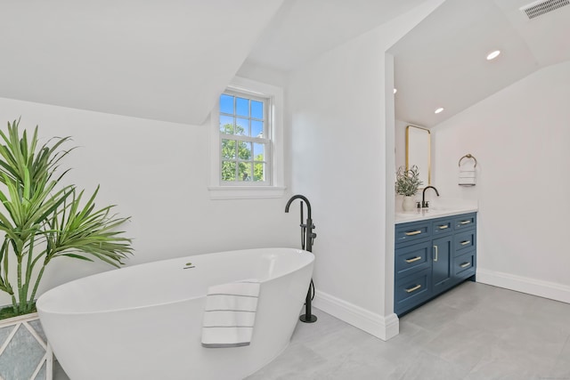 25 Conrad Rd, New Canaan, CT 06840 - bathroom featuring vanity, a soaking tub, vaulted ceiling, baseboards, and recessed lighting