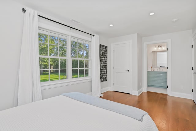 25 Conrad Rd, New Canaan, CT 06840 - bedroom with wood finished floors, baseboards, recessed lighting, and ensuite bathroom