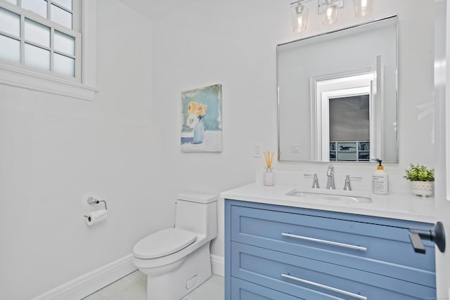 25 Conrad Rd, New Canaan, CT 06840 - bathroom with toilet, vanity, baseboards, and tile patterned flooring