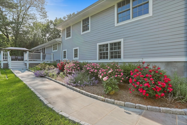 25 Conrad Rd, New Canaan, CT 06840 - view of property exterior featuring a deck