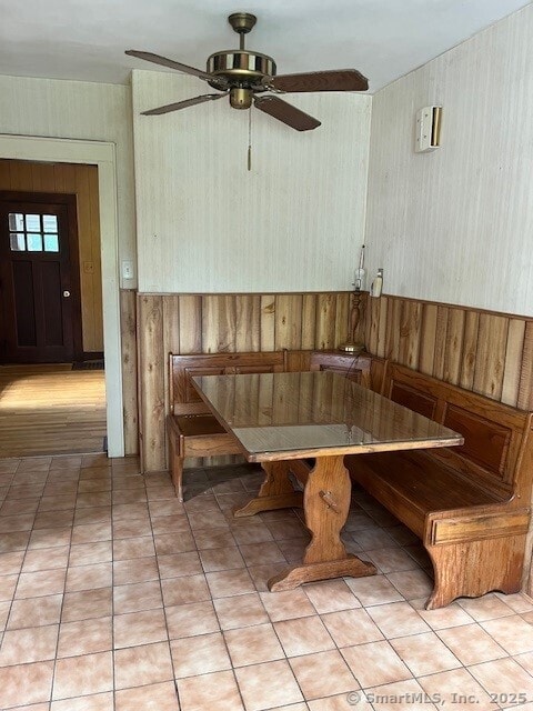 79 Van St, Stratford, CT 06614 - unfurnished dining area with breakfast area, ceiling fan, and wallpapered walls