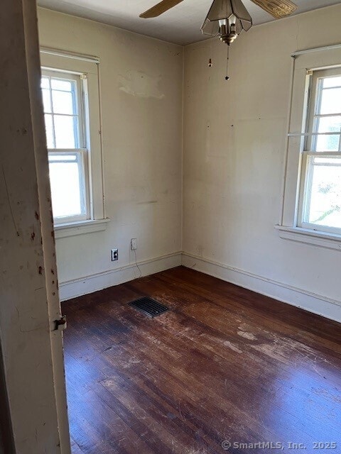 79 Van St, Stratford, CT 06614 - unfurnished room featuring hardwood / wood-style floors, ceiling fan, and healthy amount of natural light