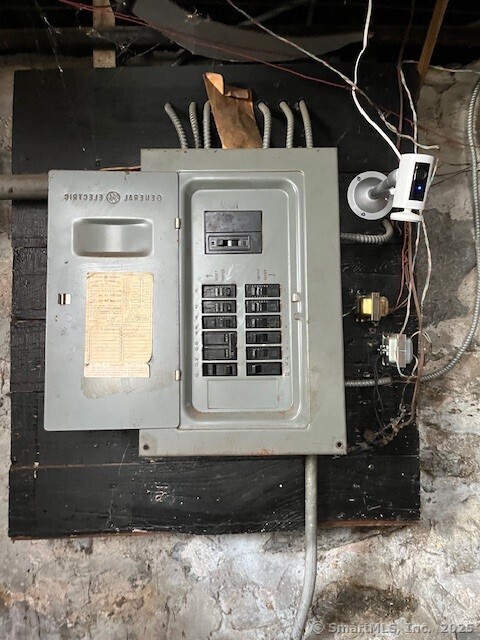 79 Van St, Stratford, CT 06614 - utility room with electric panel
