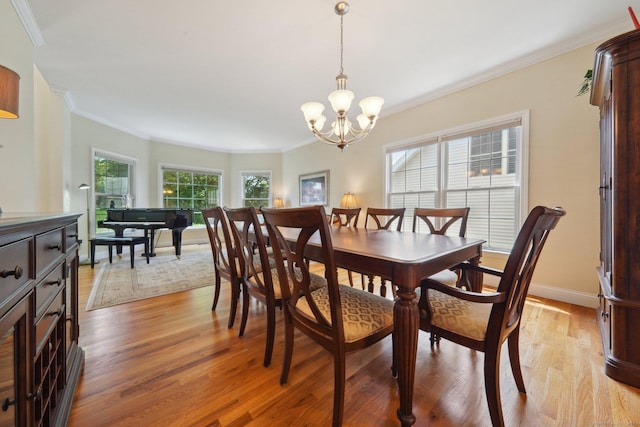 2 Tobins Ct, Danbury, CT 06810 - dining area featuring crown molding, a chandelier, and light wood-style flooring