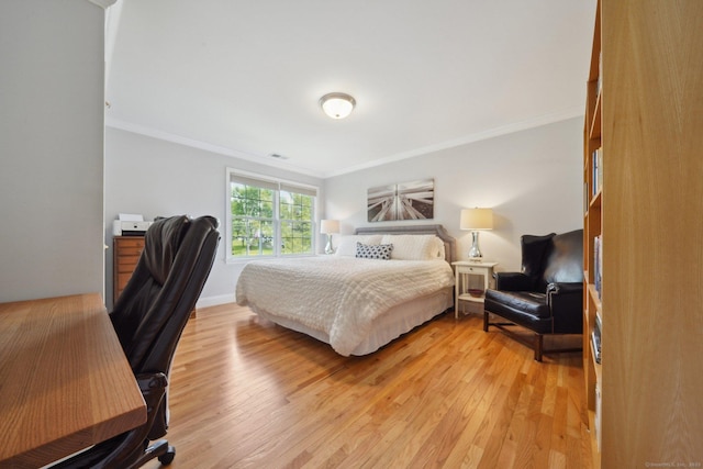 2 Tobins Ct, Danbury, CT 06810 - bedroom with ornamental molding, an office area, and light wood-type flooring