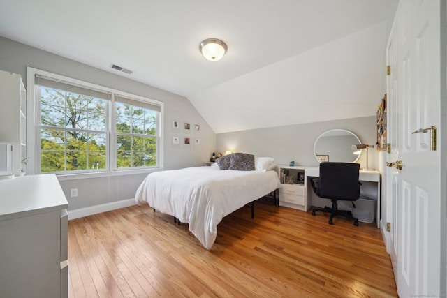 2 Tobins Ct, Danbury, CT 06810 - bedroom featuring light wood-style floors, vaulted ceiling, and an office area