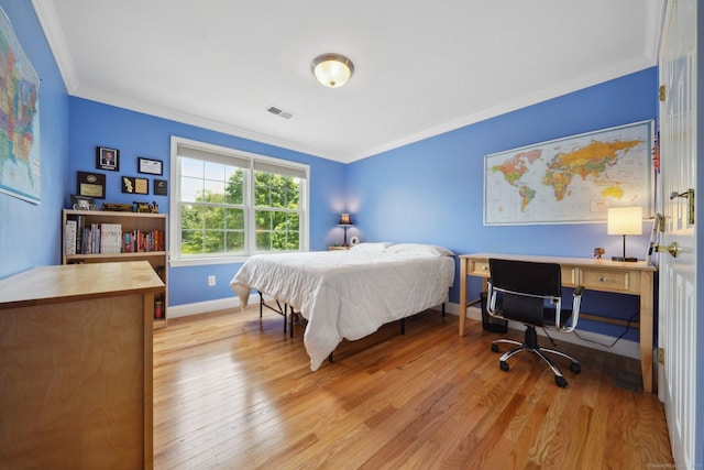 2 Tobins Ct, Danbury, CT 06810 - bedroom featuring crown molding, light wood-style floors, and a desk