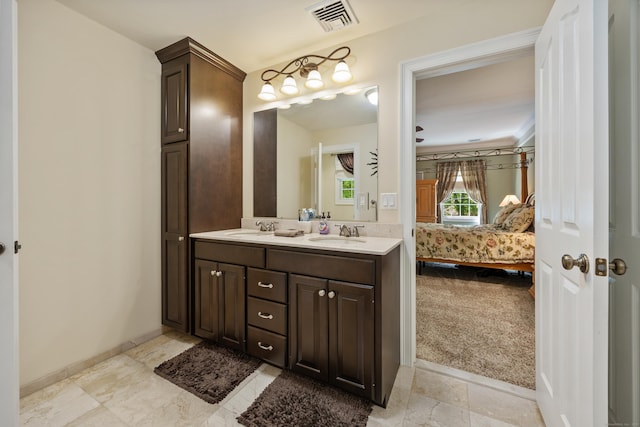 155 Garrigus Ct, Wolcott, CT 06716 - bathroom with ensuite bathroom, double vanity, and baseboards