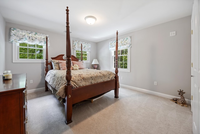 155 Garrigus Ct, Wolcott, CT 06716 - bedroom featuring multiple windows, baseboards, and light carpet