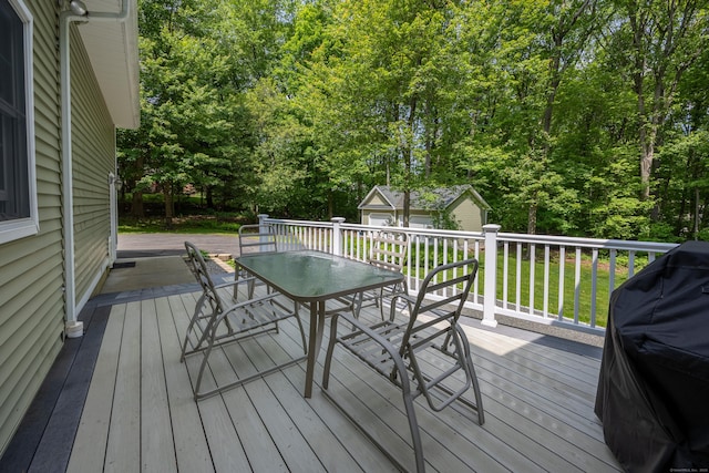 155 Garrigus Ct, Wolcott, CT 06716 - deck with outdoor dining space, an outdoor structure, and a grill