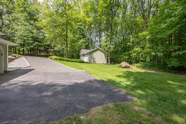 155 Garrigus Ct, Wolcott, CT 06716 - view of grassy yard with driveway