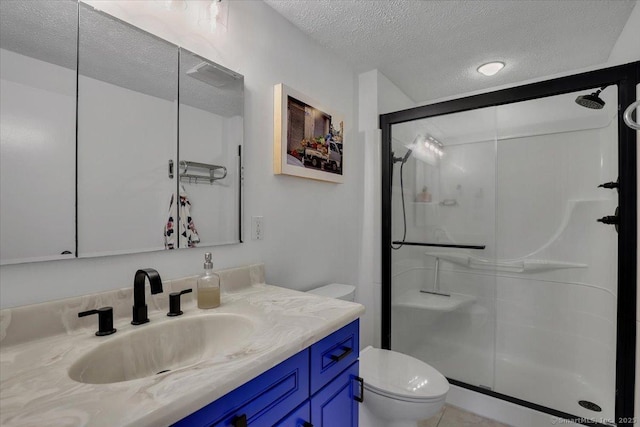 41 Blueberry Cir, Ellington, CT 06029 - full bath featuring a textured ceiling, toilet, a stall shower, and vanity