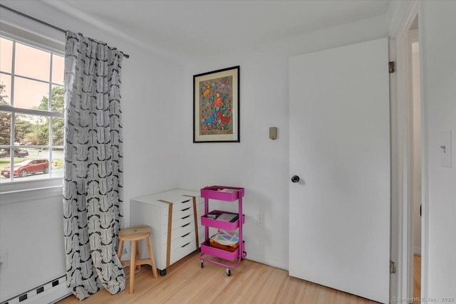 41 Blueberry Cir, Ellington, CT 06029 - recreation room with baseboard heating and wood finished floors