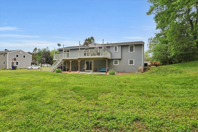 41 Blueberry Cir, Ellington, CT 06029 - rear view of property featuring a deck, stairs, a lawn, and a chimney