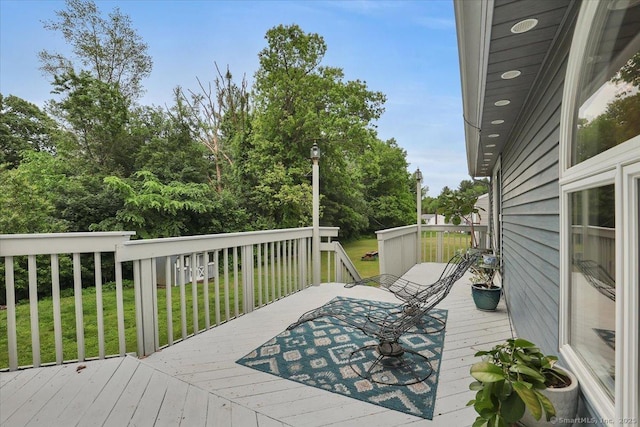 41 Blueberry Cir, Ellington, CT 06029 - deck featuring a lawn and view of scattered trees