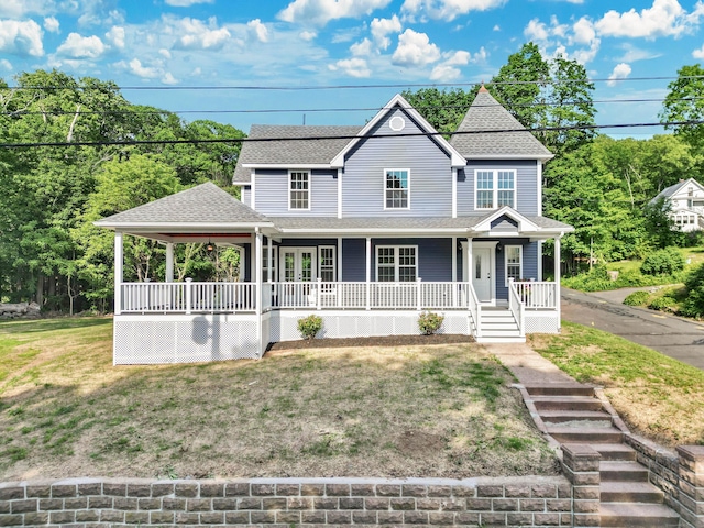 46 N Park St, Ellington, CT 06029 - view of front of home featuring covered porch, roof with shingles, and a front yard