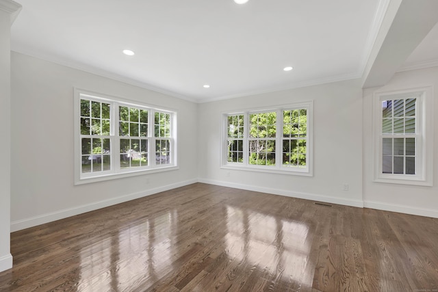 46 N Park St, Ellington, CT 06029 - empty room with crown molding, baseboards, dark wood finished floors, and recessed lighting