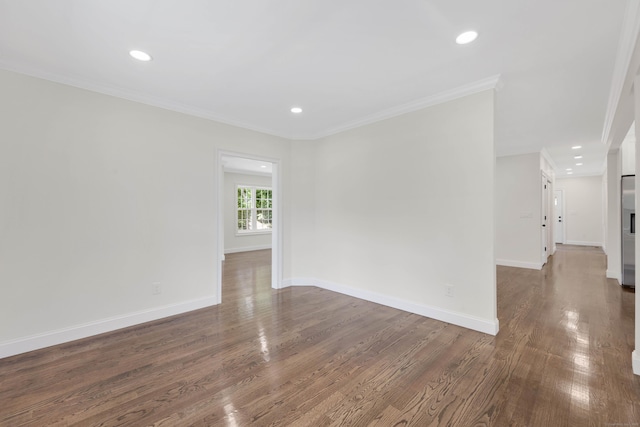 46 N Park St, Ellington, CT 06029 - spare room featuring wood finished floors, ornamental molding, baseboards, and recessed lighting