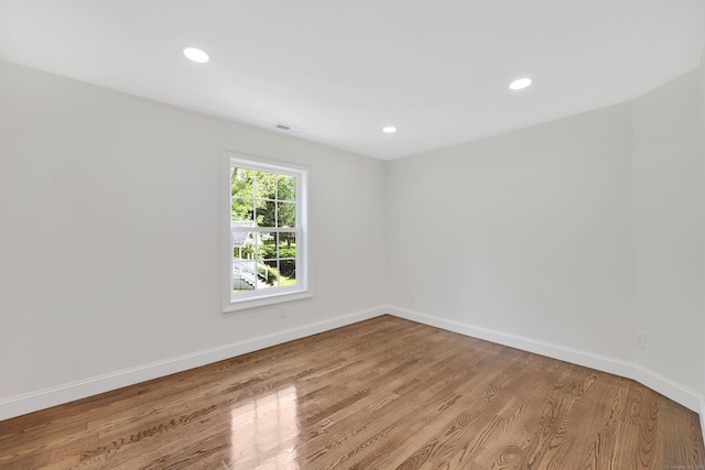 46 N Park St, Ellington, CT 06029 - unfurnished room featuring baseboards, wood finished floors, and recessed lighting