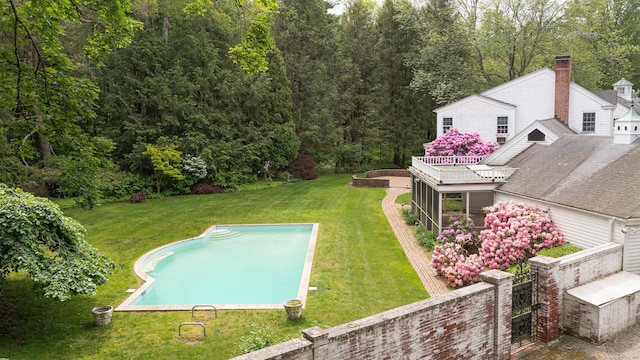130 Easton Rd, Westport, CT 06880 - outdoor pool featuring a yard and a view of trees