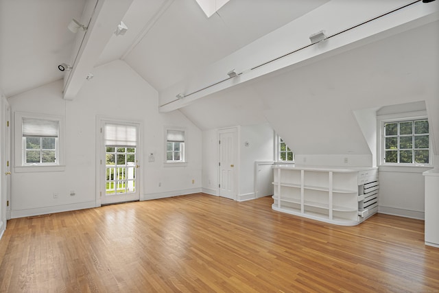 130 Easton Rd, Westport, CT 06880 - unfurnished living room featuring light wood-type flooring, plenty of natural light, and baseboards