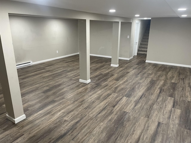 67 Geer St, Cromwell, CT 06416 - finished below grade area with a baseboard radiator, recessed lighting, baseboards, dark wood-style floors, and stairway