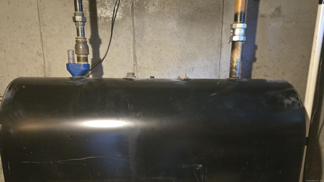 67 Geer St, Cromwell, CT 06416 - basement view of oil tank