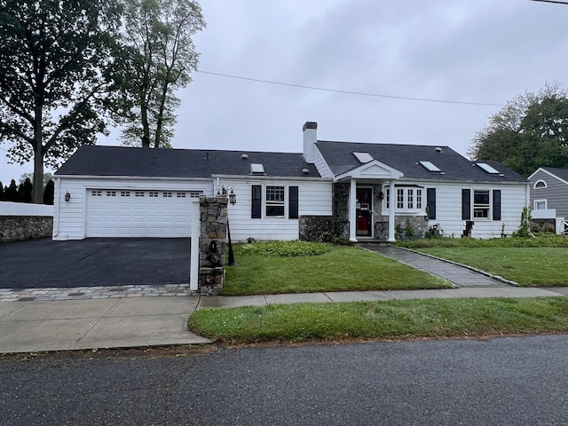 39 Commodore Pl, Milford, CT 06460 - single story home featuring stone siding, driveway, a chimney, a garage, and a front lawn