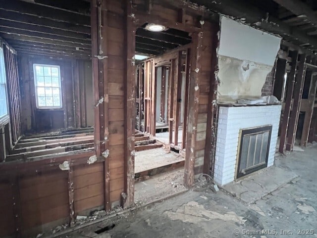 39 Commodore Pl, Milford, CT 06460 - miscellaneous room with a brick fireplace