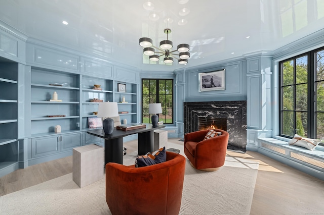 7 Dairy Rd, Greenwich, CT 06830 - home office featuring wood finished floors, plenty of natural light, a chandelier, crown molding, and recessed lighting
