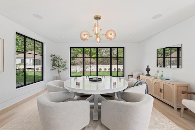 7 Dairy Rd, Greenwich, CT 06830 - dining room featuring a chandelier and light wood-style flooring