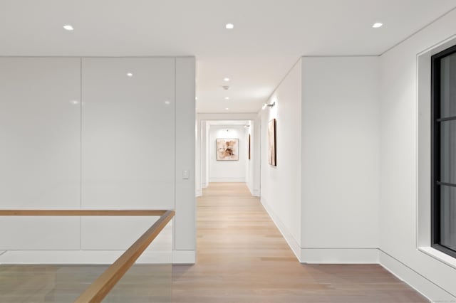 7 Dairy Rd, Greenwich, CT 06830 - hallway with light wood finished floors, recessed lighting, and baseboards