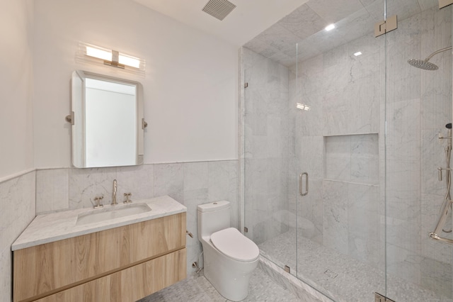 7 Dairy Rd, Greenwich, CT 06830 - full bathroom with toilet, a stall shower, tile walls, vanity, and wainscoting