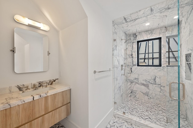 7 Dairy Rd, Greenwich, CT 06830 - bathroom with vanity, a marble finish shower, marble look tiles, baseboards, and lofted ceiling