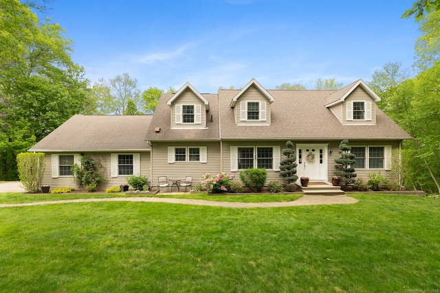 21 Dilaj Dr, Columbia, CT 06237 - new england style home featuring a front yard and roof with shingles