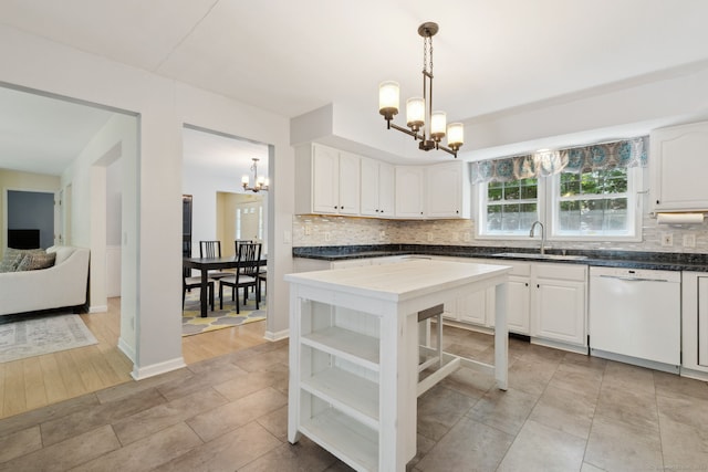 21 Dilaj Dr, Columbia, CT 06237 - kitchen with dishwasher, a sink, a chandelier, backsplash, and open shelves