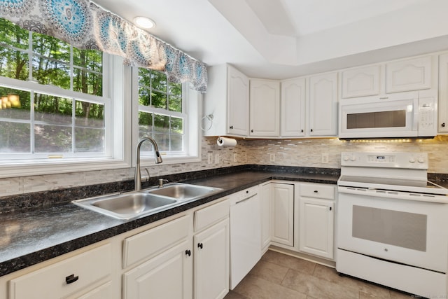 21 Dilaj Dr, Columbia, CT 06237 - kitchen featuring white appliances, a sink, tasteful backsplash, white cabinetry, and dark countertops