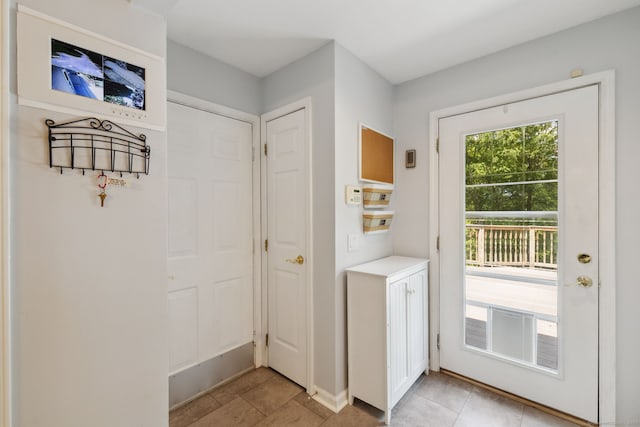 21 Dilaj Dr, Columbia, CT 06237 - entryway featuring light tile patterned flooring