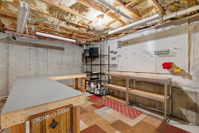 21 Dilaj Dr, Columbia, CT 06237 - unfinished basement featuring a workshop area