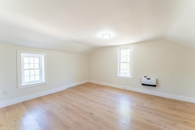 369 Thompson Rd, Thompson, CT 06277 - additional living space featuring lofted ceiling, light wood finished floors, and baseboards