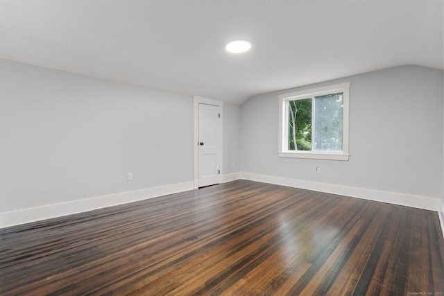 452 New Haven Ave, Derby, CT 06418 - unfurnished room featuring dark wood-style flooring, lofted ceiling, and baseboards