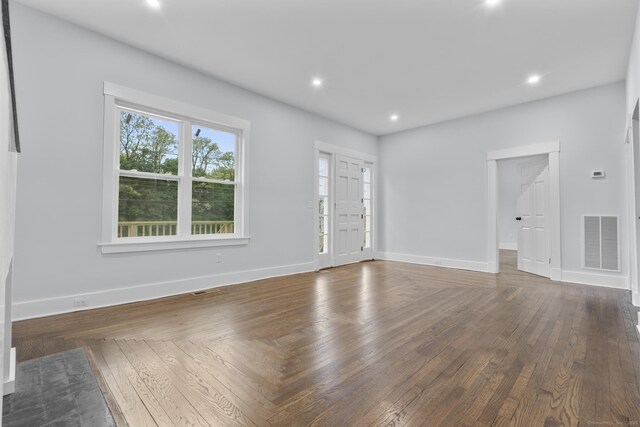 452 New Haven Ave, Derby, CT 06418 - unfurnished living room featuring baseboards, recessed lighting, and wood finished floors