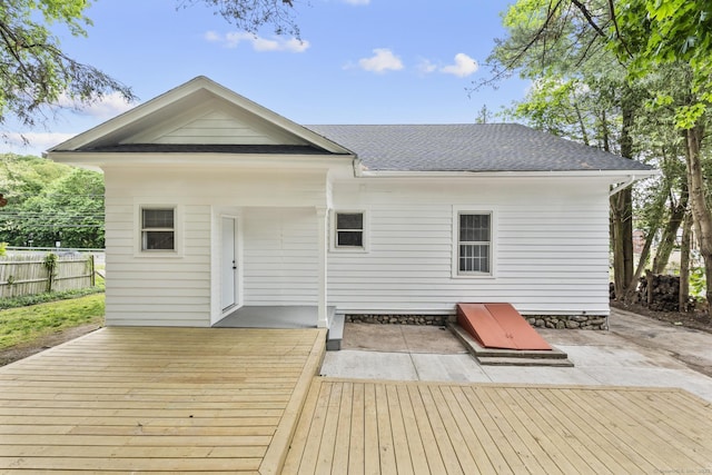 452 New Haven Ave, Derby, CT 06418 - rear view of house with a deck, a shingled roof, and a patio area