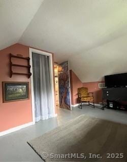64 Hayes Rd, Simsbury, CT 06081 - additional living space featuring lofted ceiling and baseboards