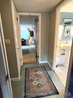 64 Hayes Rd, Simsbury, CT 06081 - corridor featuring baseboards