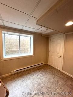 64 Hayes Rd, Simsbury, CT 06081 - below grade area featuring a baseboard heating unit and baseboards