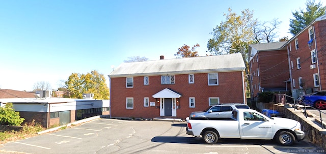 14 Park Pl Apt 4, New Britain, CT 06052 - view of front of home featuring uncovered parking and brick siding