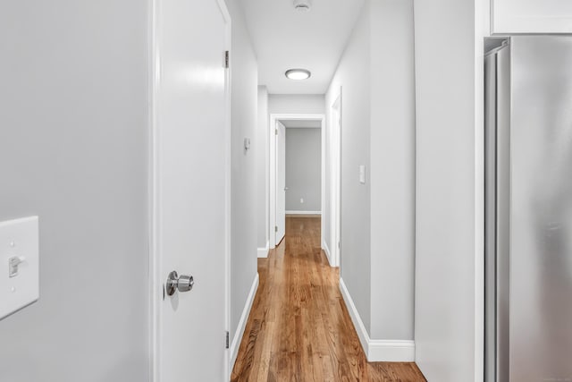 325 River Rd, Hamden, CT 06518 - corridor with light wood-style floors and baseboards