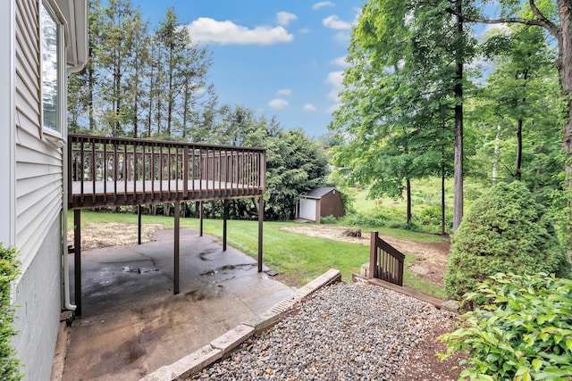 325 River Rd, Hamden, CT 06518 - view of green lawn with a patio and a deck